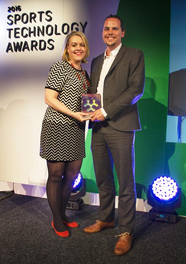 Rich Salt (right) receiving the hackathon award from Kate Dale, Sport England’s head of digital