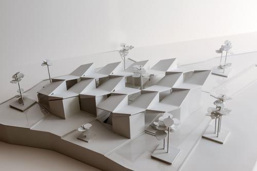 The museum is designed to seamlessly blend into the landscape with the building becoming part of the surrounding envrionment