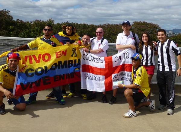 Charles (in cap on right holding the England flag) and his dad with other fans
