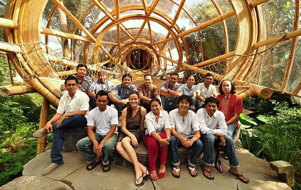 The Ibuku design team at Sharma Springs, a six level Balinese jungle retreat built by the practice almost entirely from bamboo. Founder Elora Hardy is third from left, front row 