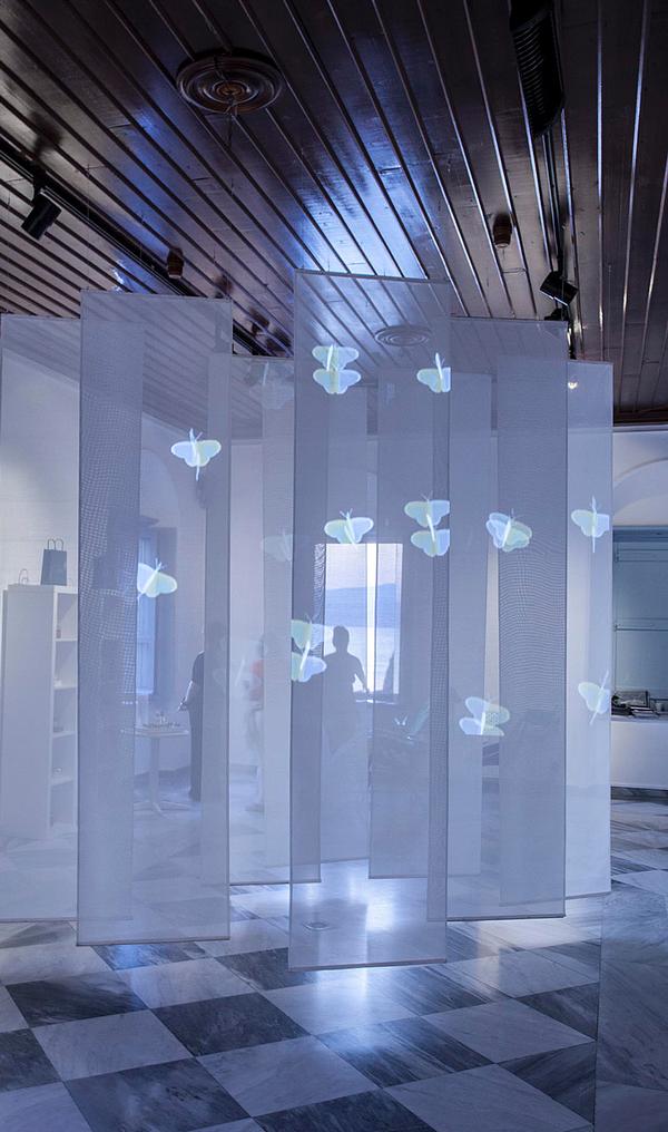 Butterflies projected on a screen form part of Valmont’s pop-up