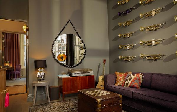 The Music Collector’s Suite features a huge collection of LP records and a vintage record player 