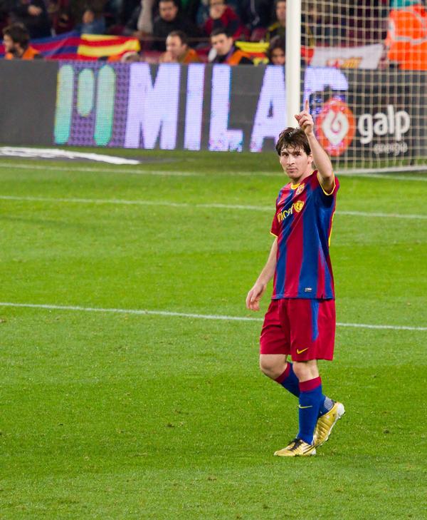 Barcelona FC forward Lionel Messi plays on synthetic 
FIFA football turf / PIC: ©www.shutterstock.com