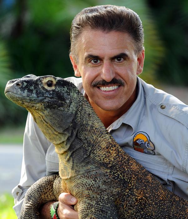 Zoo Miami’s Ron Magill, pictured with one of the attraction’s Komodo dragons / ALL PHOTOS: RON MAGILL