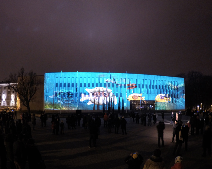 Projected on the Riga Congress Centre, United Fish is a story of a playful fish and the dangers of deep waters / Photo by Anton Rodionov, Solarisvideo