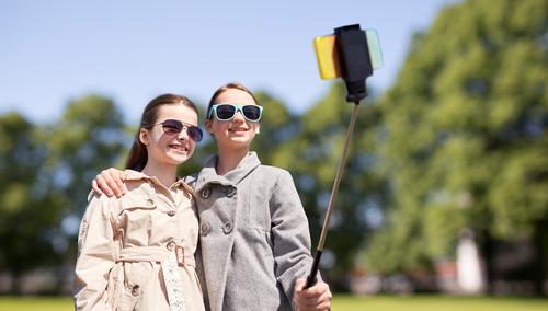 If guests arrive with selfie sticks, staff members at Disney parks will ask them to stow them / Shutterstock.com