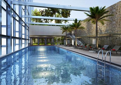The Singapore site features a rooftop pool and a deck for a variety of al fresco workouts The Singapore site features a rooftop pool and a deck for a variety of al fresco workouts