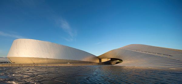 The shape of the aquarium resembles a giant whirlpool