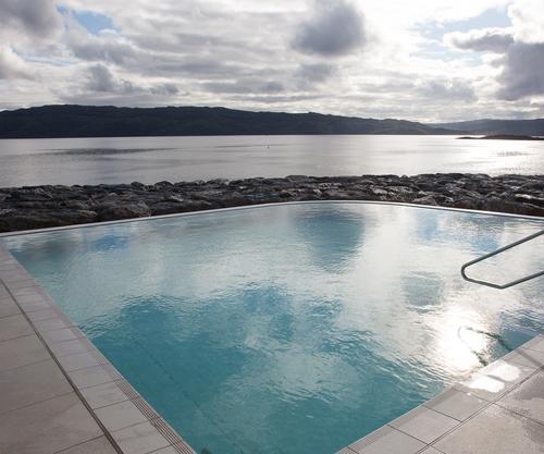 The spa and leisure centre includes four treatment rooms and six swimming pools / Portavadie