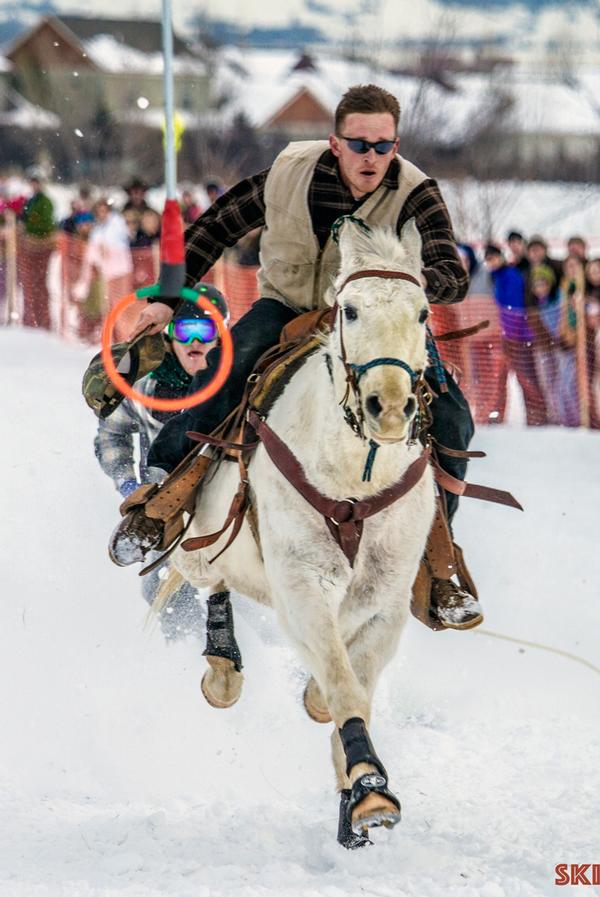 Competitors must negotiate gates and jumps, grabbing rings as they go / Skijoring America