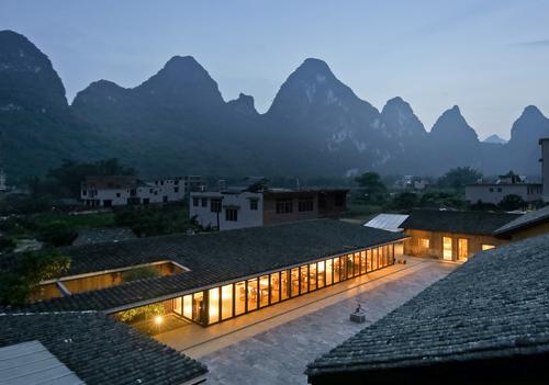 The 3,000sq m resort is located in Yangjia Village, southern China, among the jungle-topped karst mountains of the Li River valley / Su Shengliang