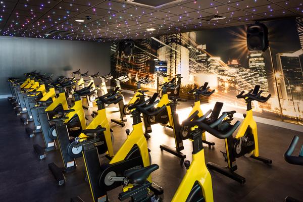 The new group cycling studio features 30 bike stations