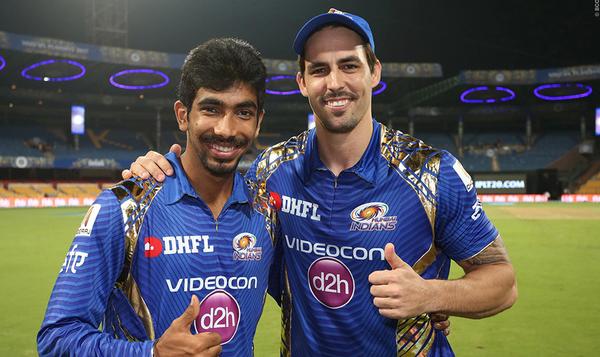 Australian cricketer Mitchell Johnson (right) was recruited to the IPL in 2014 to help draw crowds
