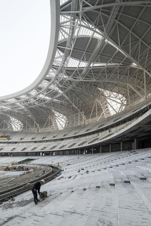 The stadium will host the 2022 Asian Games / NBBJ Design