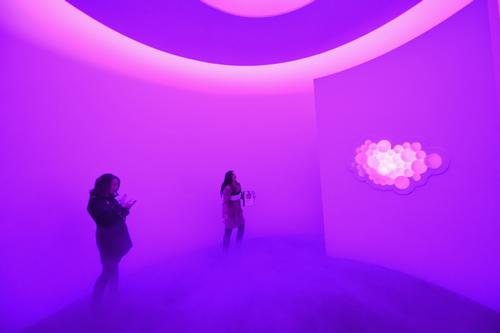The purple cloud room forms low-lying fog over ultra-comfortable carpet to create the illusion of walking in the clouds / Radical Media
