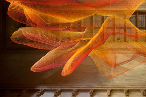 A suspended, handwoven net created by Janet Echelman / Ron Blunt