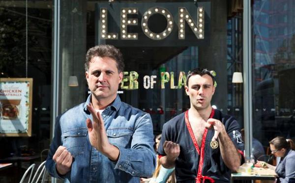 John Vincent, the founder of Leon (left) with martial arts expert Julian Hitch