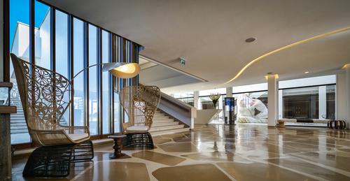 The interiors were designed to mirror the building's minimalist exteriors / Elma Arts Complex Luxury Hotel 