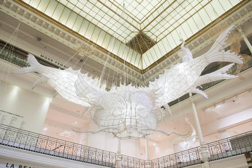 A woven bamboo dragon floats in the store's main gallery / Le Bon Marché