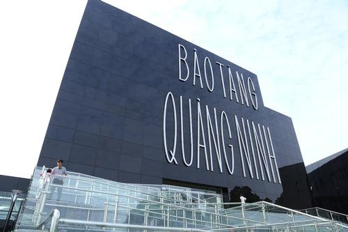The museum's name is written on the front of the building in huge illuminated letters / S Design 