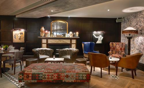 The designers have used colourful and eclectic furniture / D&D London