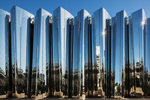 The stainless steel, shimmering design pays homage to the New Zealand-born Lye / Patterson Associates