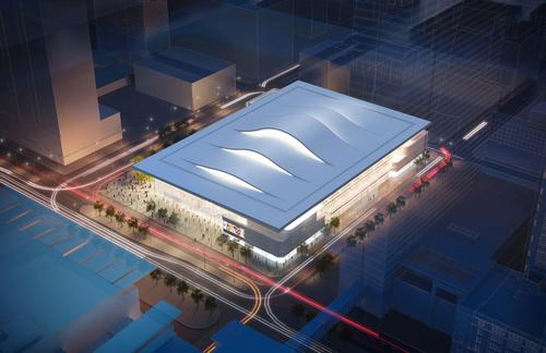 The arena’s design features a curving roof that swells over the seating areas and a transparent glass facade which allows passersby to glimpse the action taking place within / Pelli Clarke Pelli