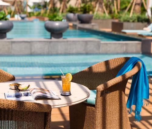 Raffles Indonesia features two pools, a fitness centre, yoga terrace, tennis courts, and a jogging track / Raffles