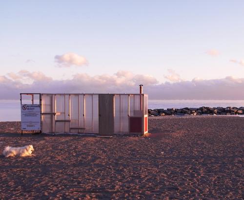 The polycarbonate outer skin of the sauna gives winter walkers a steamy glimpse of the bathers within