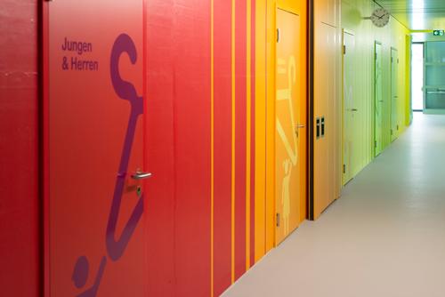 'Not only is it easier for children to navigate with colour, it’s also more playful and taps into the way children see the world,' said the architects / Sue Baer Fotografie