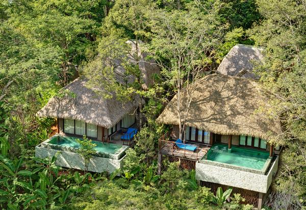 The 16 Clay Pool Cottages feature thatched roofs inspired by Phuket’s farming communities
