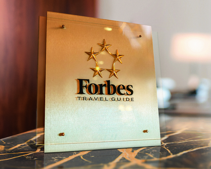 Forbes Travel Guide awarded the brand with the 'In partnership with' seal / 