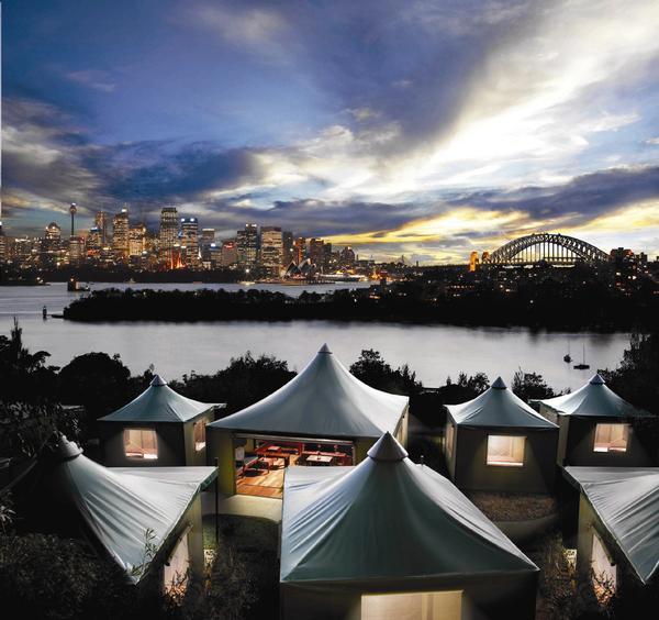 Enjoy spectacular views of Sydney from your cliff-edge safari tent at Taronga Zoo