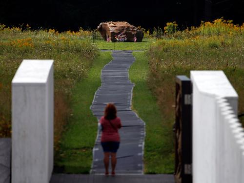 The large boulder marks the point at which the plane hit the ground