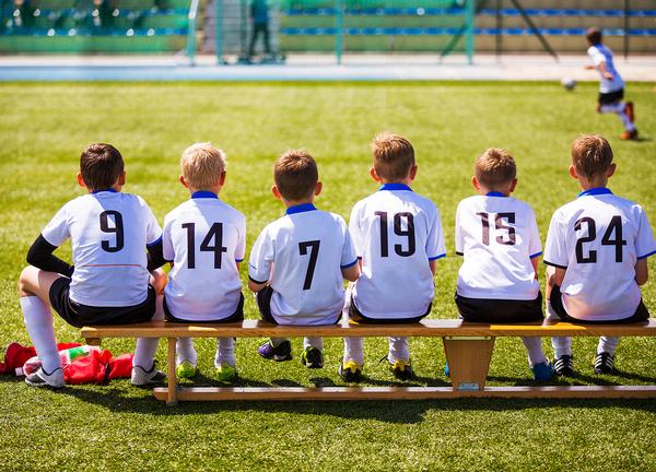Team sports involve a lot of sitting around – your child may not be fit / Shutterstock.com