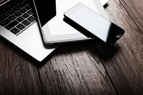 Widespread laptop adoption will continue, as consumers use PCs to complement their smartphones and tablets / Shutterstock.com