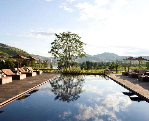 The resort also includes an outdoor swimming pool with views of the Douro Valley / Six Senses