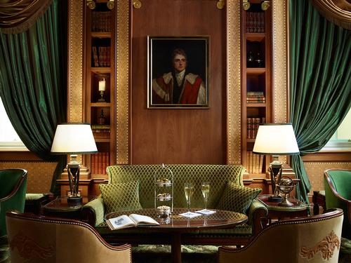 Cocktails or Champagne are on offer at the artfully refurbished Library Bar / The Lanesborough Hotel