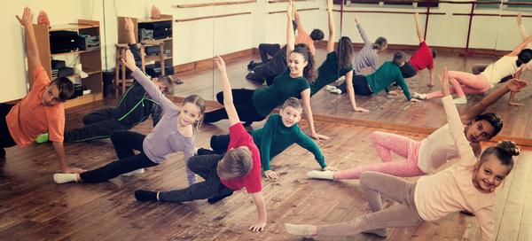 Teachers lead dance classes / shutterstock