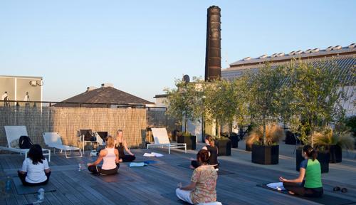 The site, once a graphics workshop, includes a rooftop yoga space / The Printworks