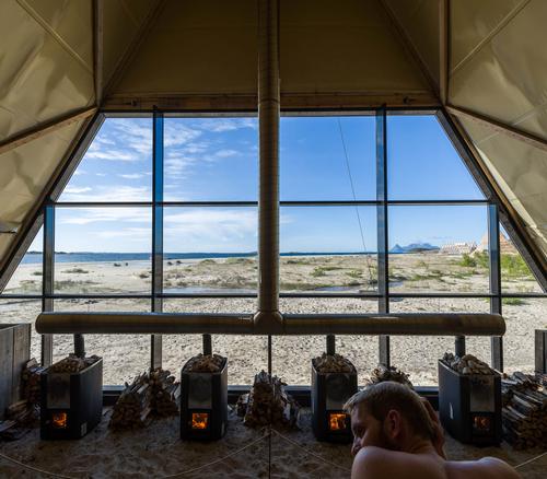 The glass-fronted Agora Sauna holds more than 100 people and looks out onto the Arctic Sea / Salt Sauna, Bodø, Norway, (c) Gunnar Holmstad, courtesy salted.no 