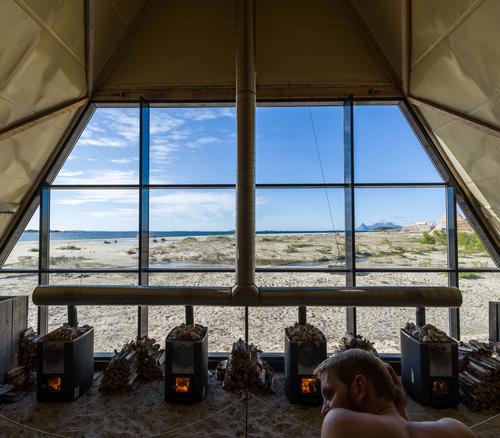 The glass-fronted Agora Sauna holds more than 100 people and looks out onto the Arctic Sea / Salt Sauna, Bodø, Norway, (c) Gunnar Holmstad, courtesy salted.no
