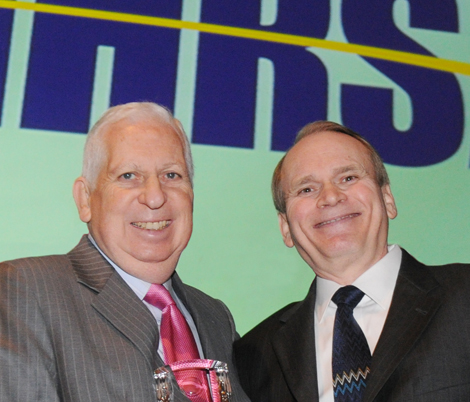 Veteran Rick Caro (left)