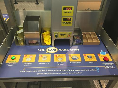 A station simulating making a can of Spam is among the exhibits on display