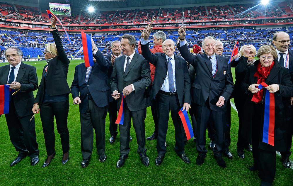 Aulas (fifth from right) alongside dignitaries before the stadium’s opening match