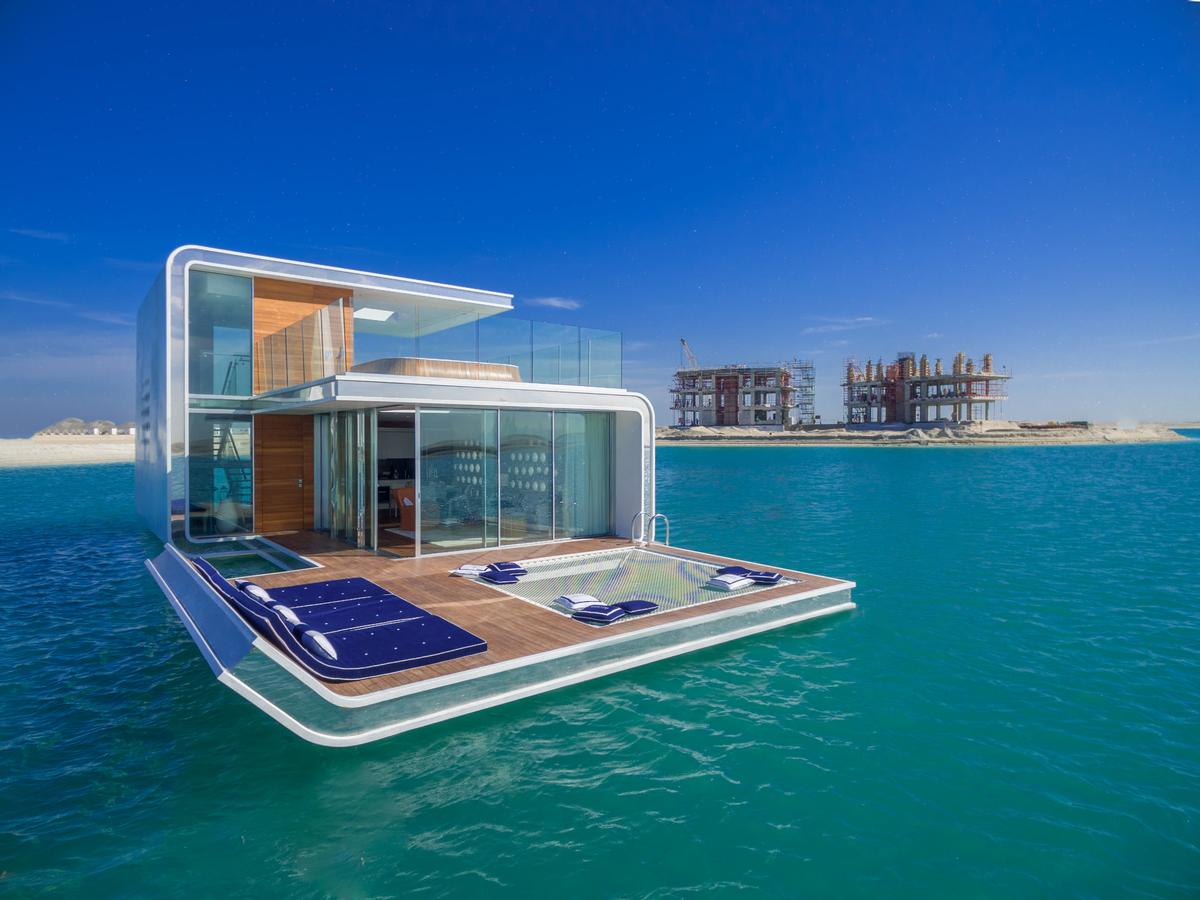 The luxury villas contain three levels, one of which is underwater / Kleindienst Group