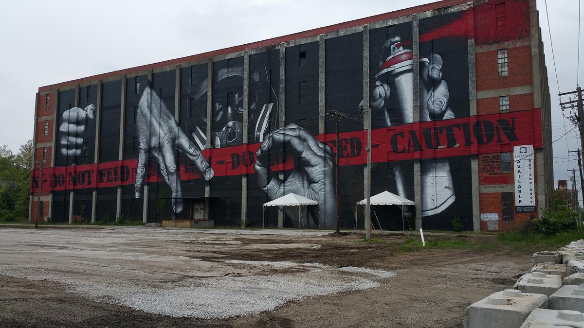 An old bourbon ageing facility is being restored into a five-story facility with a gastropub, cafe, restaurant and large mural / Barry McNees