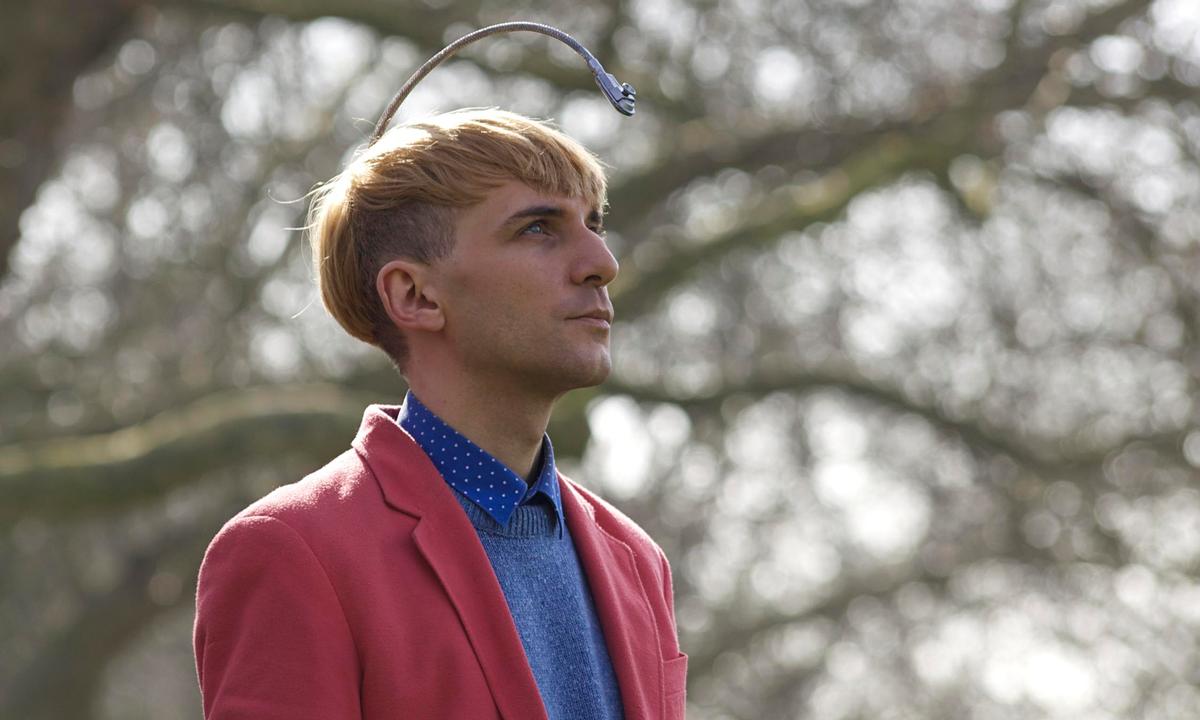 The colourblind 'Human Cyborg' Neil Harbisson uses an implanted device that allows him to hear colours The colourblind 'Human Cyborg' Neil Harbisson uses an implanted device that allows him to hear colours