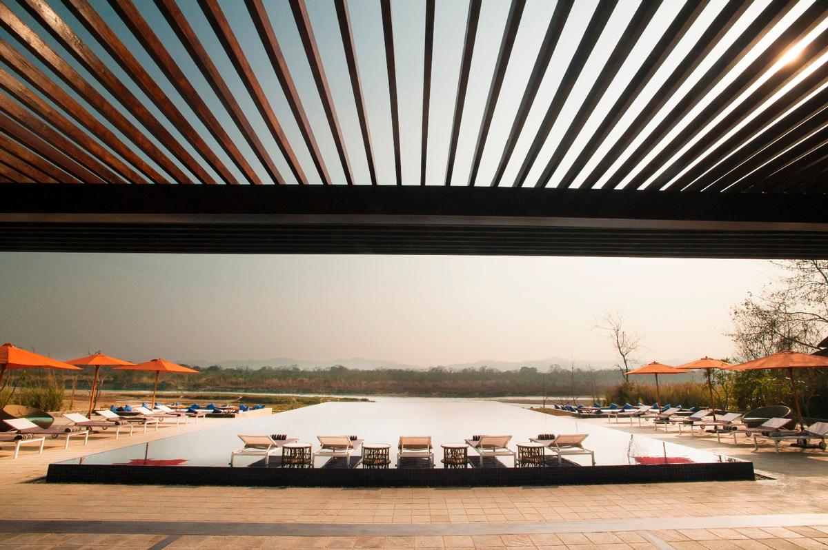 Local design andm materials played an important role in the project / Taj Safari