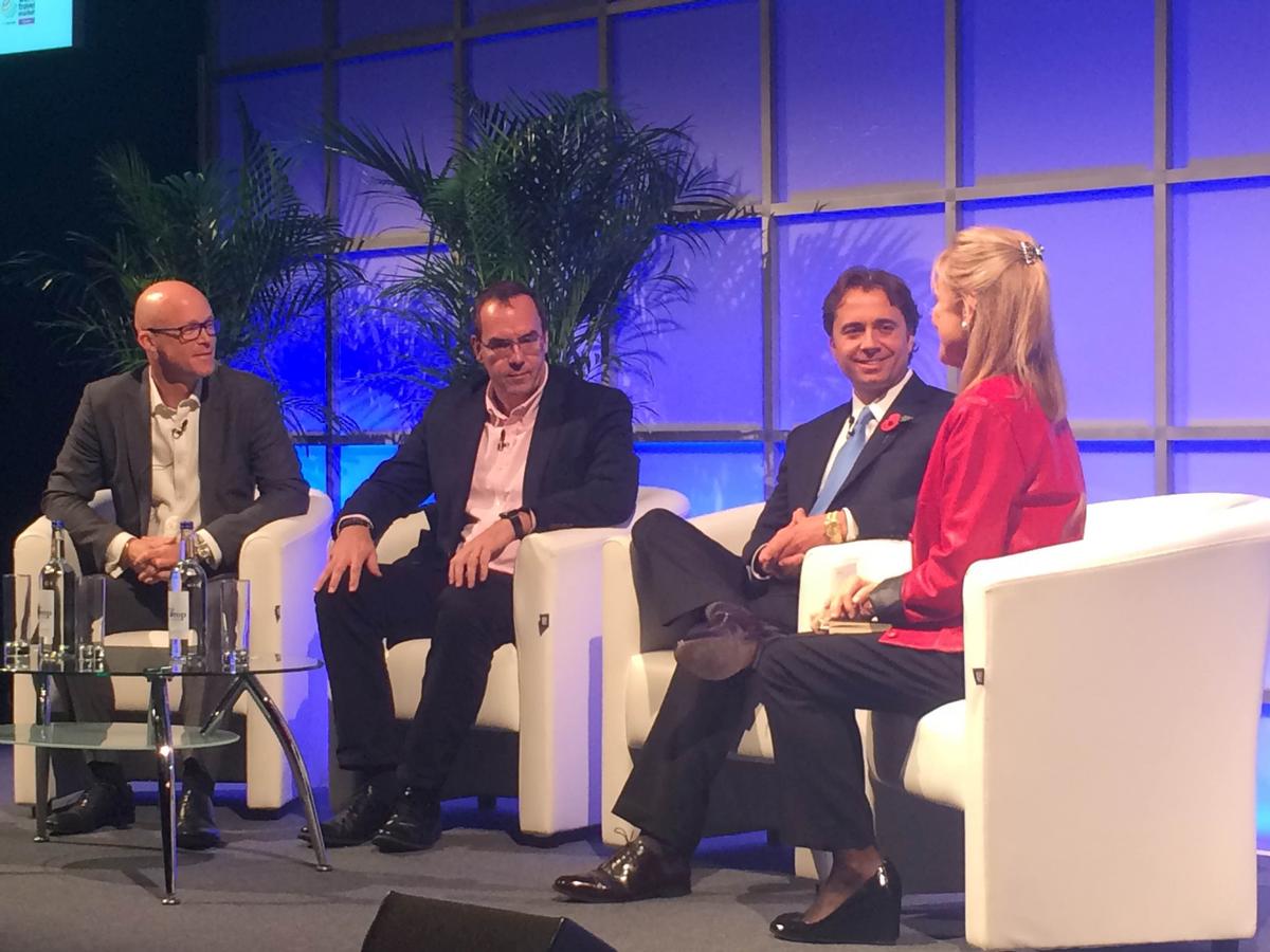 Andrew Barnard, far left, spoke at a panel at the World Travel Market moderated by Susie Ellis, far right, chair of the Global Wellness Institute / 